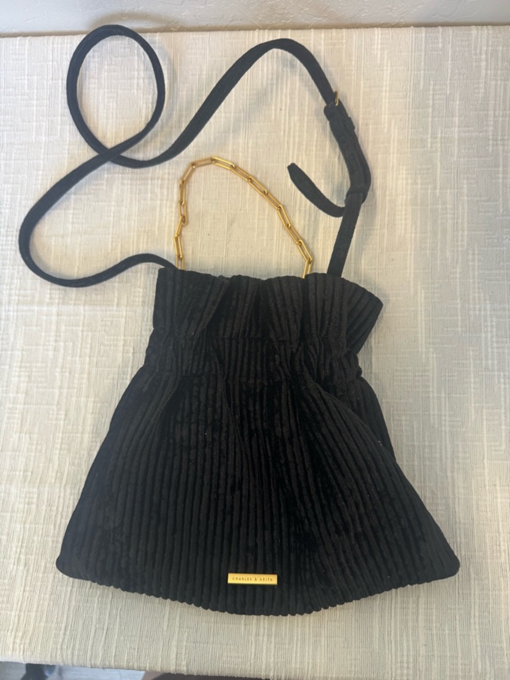 CHARLES & KEITH Black Corduroy Drawstring Bucket Bag with Gold Chain